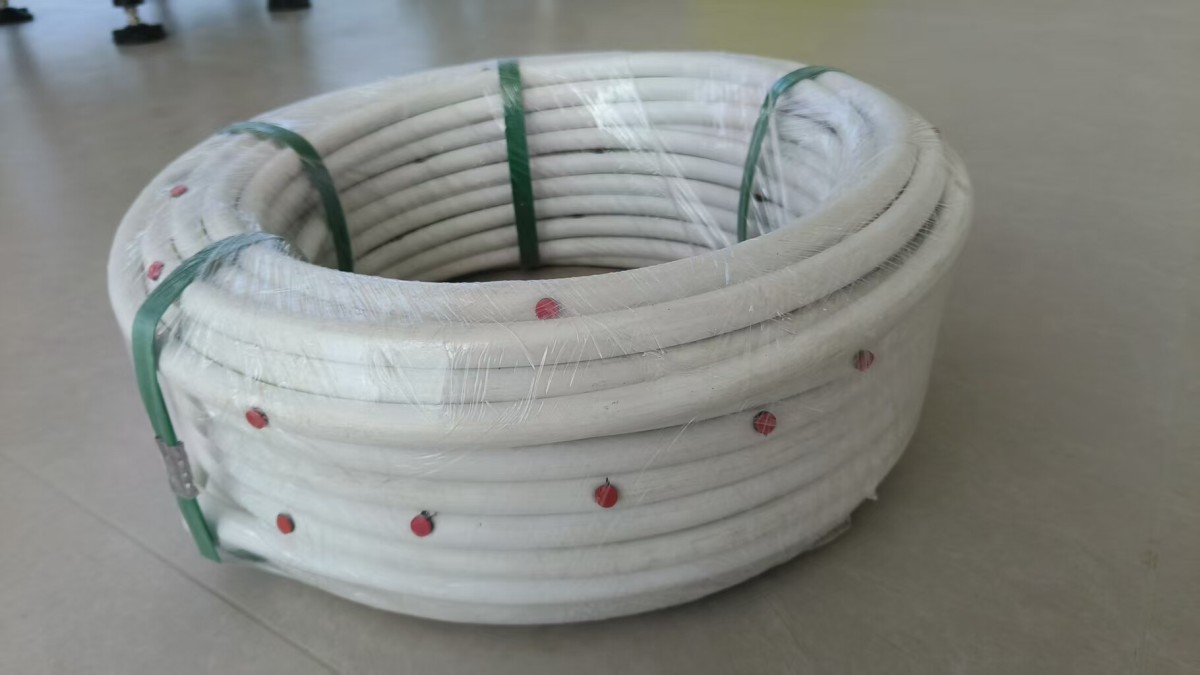 纽扣滴头在线滴灌管1.jpg 纽扣滴头在线滴灌管1.jpg